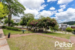 Casa em Condomínio à venda com 190m², 3 dormitórios, 1 suíte, 2 vagas, no bairro Vila Nova em PORTO ALEGRE
