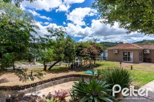 Casa em Condomínio à venda com 190m², 3 dormitórios, 1 suíte, 2 vagas, no bairro Vila Nova em PORTO ALEGRE