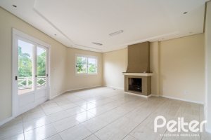 Casa à venda com 208m², 3 dormitórios, 1 suíte, 4 vagas, no bairro Ipanema em Porto Alegre