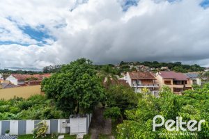 Casa à venda com 208m², 3 dormitórios, 1 suíte, 4 vagas, no bairro Ipanema em Porto Alegre