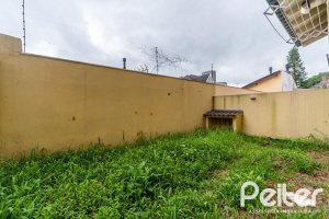 Casa à venda com 208m², 3 dormitórios, 1 suíte, 4 vagas, no bairro Ipanema em Porto Alegre