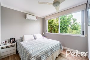 Casa em Condomínio à venda com 271m², 3 dormitórios, 1 suíte, 2 vagas, no bairro Vila Assunção em Porto Alegre