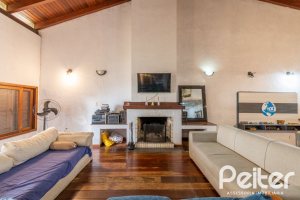 Casa à venda com 390m², 4 dormitórios, 1 suíte, 3 vagas, no bairro Santa Tereza em Porto Alegre