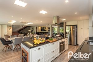 Casa em Condomínio à venda com 478m², 4 dormitórios, 4 suítes, 4 vagas, no bairro Terra Ville em PORTO ALEGRE