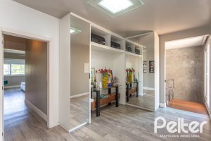 Casa em Condomínio à venda com 478m², 4 dormitórios, 4 suítes, 4 vagas, no bairro Terra Ville em PORTO ALEGRE