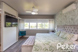 Casa em Condomínio à venda com 478m², 4 dormitórios, 4 suítes, 4 vagas, no bairro Terra Ville em PORTO ALEGRE