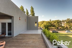 Casa em Condomínio à venda com 478m², 4 dormitórios, 4 suítes, 4 vagas, no bairro Terra Ville em PORTO ALEGRE