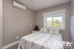 Casa em Condomínio à venda com 478m², 4 dormitórios, 4 suítes, 4 vagas, no bairro Terra Ville em PORTO ALEGRE