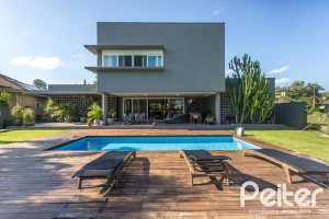 Casa em Condomínio à venda com 478m², 4 dormitórios, 4 suítes, 4 vagas, no bairro Terra Ville em PORTO ALEGRE