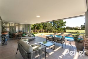 Casa em Condomínio à venda com 478m², 4 dormitórios, 4 suítes, 4 vagas, no bairro Terra Ville em PORTO ALEGRE