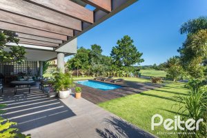 Casa em Condomínio à venda com 478m², 4 dormitórios, 4 suítes, 4 vagas, no bairro Terra Ville em PORTO ALEGRE