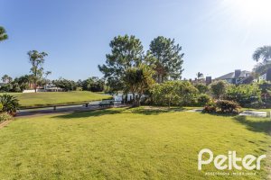 Casa em Condomínio à venda com 478m², 4 dormitórios, 4 suítes, 4 vagas, no bairro Terra Ville em PORTO ALEGRE