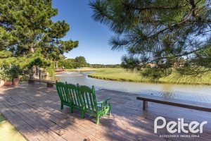 Casa em Condomínio à venda com 478m², 4 dormitórios, 4 suítes, 4 vagas, no bairro Terra Ville em PORTO ALEGRE