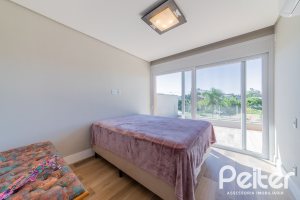 Casa em Condomínio à venda com 363m², 3 dormitórios, 3 suítes, 4 vagas, no bairro Terra Ville em PORTO ALEGRE