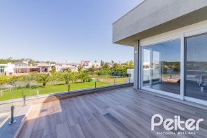 Casa em Condomínio à venda com 363m², 3 dormitórios, 3 suítes, 4 vagas, no bairro Terra Ville em PORTO ALEGRE