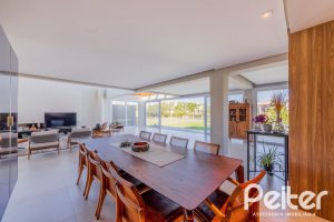 Casa em Condomínio à venda com 363m², 3 dormitórios, 3 suítes, 4 vagas, no bairro Terra Ville em PORTO ALEGRE