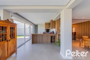 Casa em Condomínio à venda com 363m², 3 dormitórios, 3 suítes, 4 vagas, no bairro Terra Ville em PORTO ALEGRE