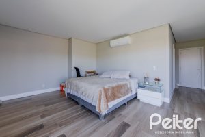 Casa em Condomínio à venda com 363m², 3 dormitórios, 3 suítes, 4 vagas, no bairro Terra Ville em PORTO ALEGRE