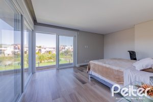 Casa em Condomínio à venda com 363m², 3 dormitórios, 3 suítes, 4 vagas, no bairro Terra Ville em PORTO ALEGRE