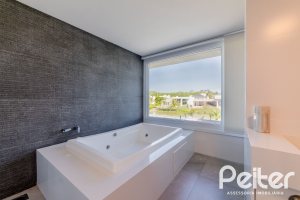 Casa em Condomínio à venda com 363m², 3 dormitórios, 3 suítes, 4 vagas, no bairro Terra Ville em PORTO ALEGRE