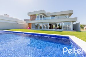 Casa em Condomínio à venda com 363m², 3 dormitórios, 3 suítes, 4 vagas, no bairro Terra Ville em PORTO ALEGRE