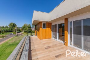 Casa em Condomínio à venda com 363m², 3 dormitórios, 3 suítes, 4 vagas, no bairro Terra Ville em PORTO ALEGRE