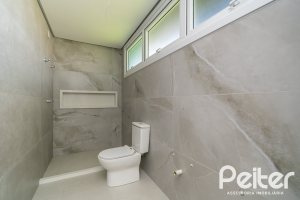 Casa em Condomínio à venda com 292m², 4 dormitórios, 4 suítes, 4 vagas, no bairro Alphaville em PORTO ALEGRE