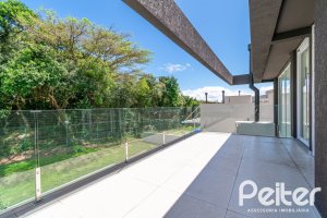 Casa em Condomínio à venda com 292m², 4 dormitórios, 4 suítes, 4 vagas, no bairro Alphaville em PORTO ALEGRE