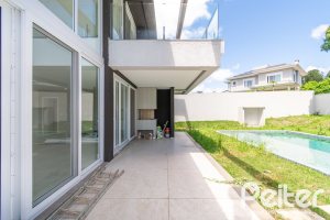 Casa em Condomínio à venda com 292m², 4 dormitórios, 4 suítes, 4 vagas, no bairro Alphaville em PORTO ALEGRE