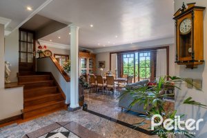 Casa em Condomínio à venda com 459m², 4 dormitórios, 4 suítes, 3 vagas, no bairro Cavalhada em PORTO ALEGRE