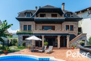 Casa em Condomínio à venda com 459m², 4 dormitórios, 4 suítes, 3 vagas, no bairro Cavalhada em PORTO ALEGRE