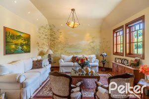 Casa em Condomínio à venda com 459m², 4 dormitórios, 4 suítes, 3 vagas, no bairro Cavalhada em PORTO ALEGRE