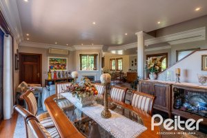 Casa em Condomínio à venda com 459m², 4 dormitórios, 4 suítes, 3 vagas, no bairro Cavalhada em PORTO ALEGRE