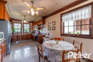 Casa em Condomínio à venda com 459m², 4 dormitórios, 4 suítes, 3 vagas, no bairro Cavalhada em PORTO ALEGRE