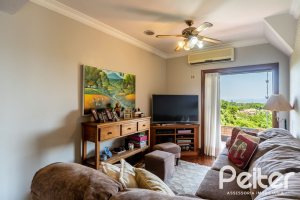 Casa em Condomínio à venda com 459m², 4 dormitórios, 4 suítes, 3 vagas, no bairro Cavalhada em PORTO ALEGRE