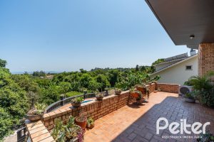 Casa em Condomínio à venda com 459m², 4 dormitórios, 4 suítes, 3 vagas, no bairro Cavalhada em PORTO ALEGRE