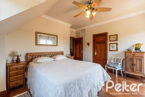 Casa em Condomínio à venda com 459m², 4 dormitórios, 4 suítes, 3 vagas, no bairro Cavalhada em PORTO ALEGRE