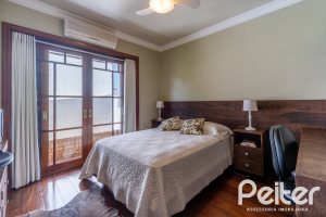 Casa em Condomínio à venda com 459m², 4 dormitórios, 4 suítes, 3 vagas, no bairro Cavalhada em PORTO ALEGRE