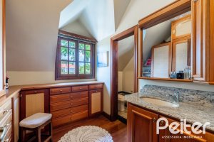 Casa em Condomínio à venda com 459m², 4 dormitórios, 4 suítes, 3 vagas, no bairro Cavalhada em PORTO ALEGRE