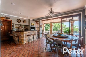 Casa em Condomínio à venda com 459m², 4 dormitórios, 4 suítes, 3 vagas, no bairro Cavalhada em PORTO ALEGRE