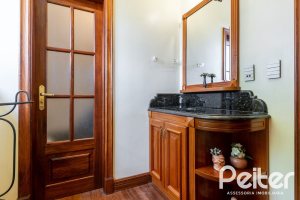 Casa em Condomínio à venda com 459m², 4 dormitórios, 4 suítes, 3 vagas, no bairro Cavalhada em PORTO ALEGRE