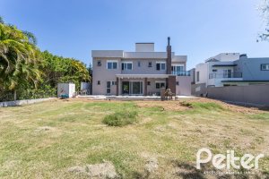 Casa em Condomínio à venda com 566m², 5 dormitórios, 5 suítes, 4 vagas, no bairro Terra Ville em PORTO ALEGRE