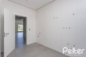 Casa em Condomínio à venda com 566m², 5 dormitórios, 5 suítes, 4 vagas, no bairro Terra Ville em PORTO ALEGRE