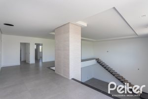 Casa em Condomínio à venda com 566m², 5 dormitórios, 5 suítes, 4 vagas, no bairro Terra Ville em PORTO ALEGRE