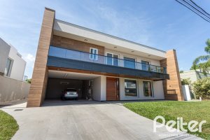 Casa em Condomínio à venda com 566m², 5 dormitórios, 5 suítes, 4 vagas, no bairro Terra Ville em PORTO ALEGRE