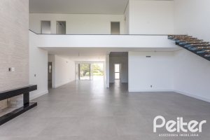 Casa em Condomínio à venda com 566m², 5 dormitórios, 5 suítes, 4 vagas, no bairro Terra Ville em PORTO ALEGRE