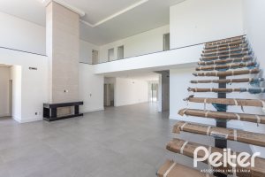 Casa em Condomínio à venda com 566m², 5 dormitórios, 5 suítes, 4 vagas, no bairro Terra Ville em PORTO ALEGRE