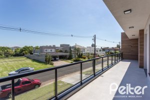 Casa em Condomínio à venda com 566m², 5 dormitórios, 5 suítes, 4 vagas, no bairro Terra Ville em PORTO ALEGRE