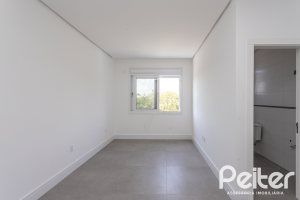 Casa em Condomínio à venda com 566m², 5 dormitórios, 5 suítes, 4 vagas, no bairro Terra Ville em PORTO ALEGRE