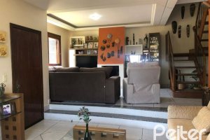 Casa em Condomínio à venda com 304m², 4 dormitórios, 1 suíte, 3 vagas, no bairro Vila Nova em Porto Alegre